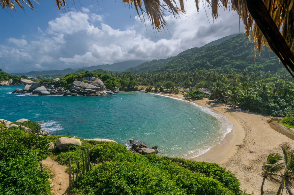 Tayrona National Park, Colombia, with its coconut palms, granite boulders and dense impenetrable looking jungle. 