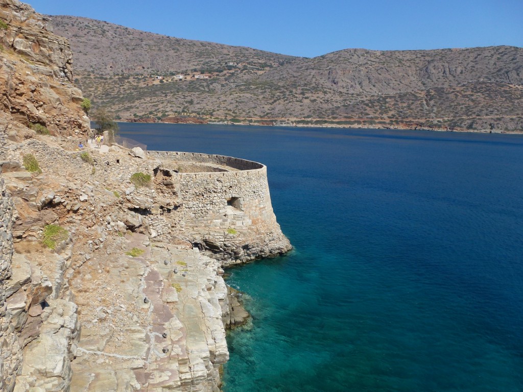 The walkway on the ancient wall encircling the island of Spinalonga in the Gulf of Elounda, Crete, Greece.