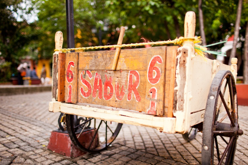 A street cart sits in the middle of Plaza de San Diego, Cartagena, Colombia, a booming area for tourists and locals alike.