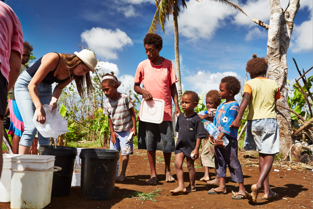 Queuing up for clean drinking water, Vanuatu. Photo by Matt Crawford