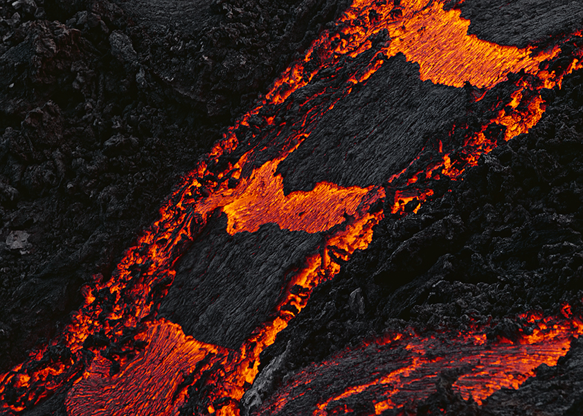 Volcanic Activity: Crust slabs on a glowing lava stream 