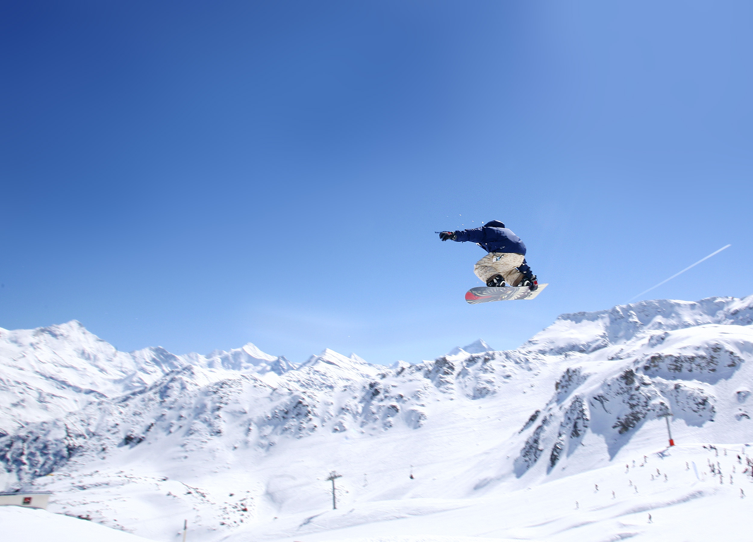  A skier mid-jump in Grimentz