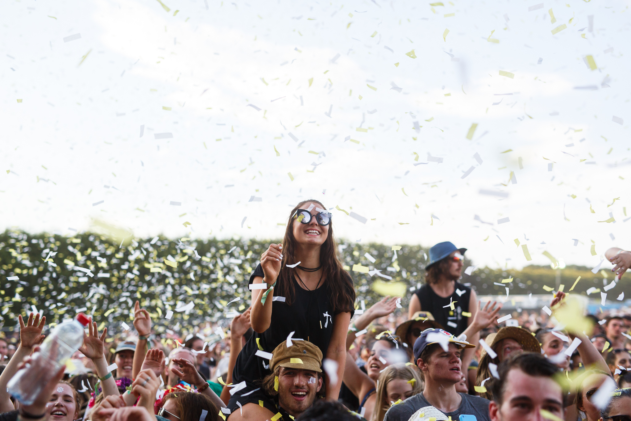 Confetti raining down on an exuberant crowd
