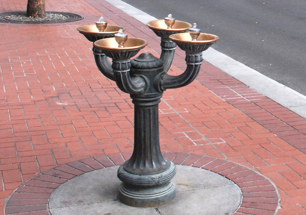 A four armed Benson Bubbler metal fountain in central Portland