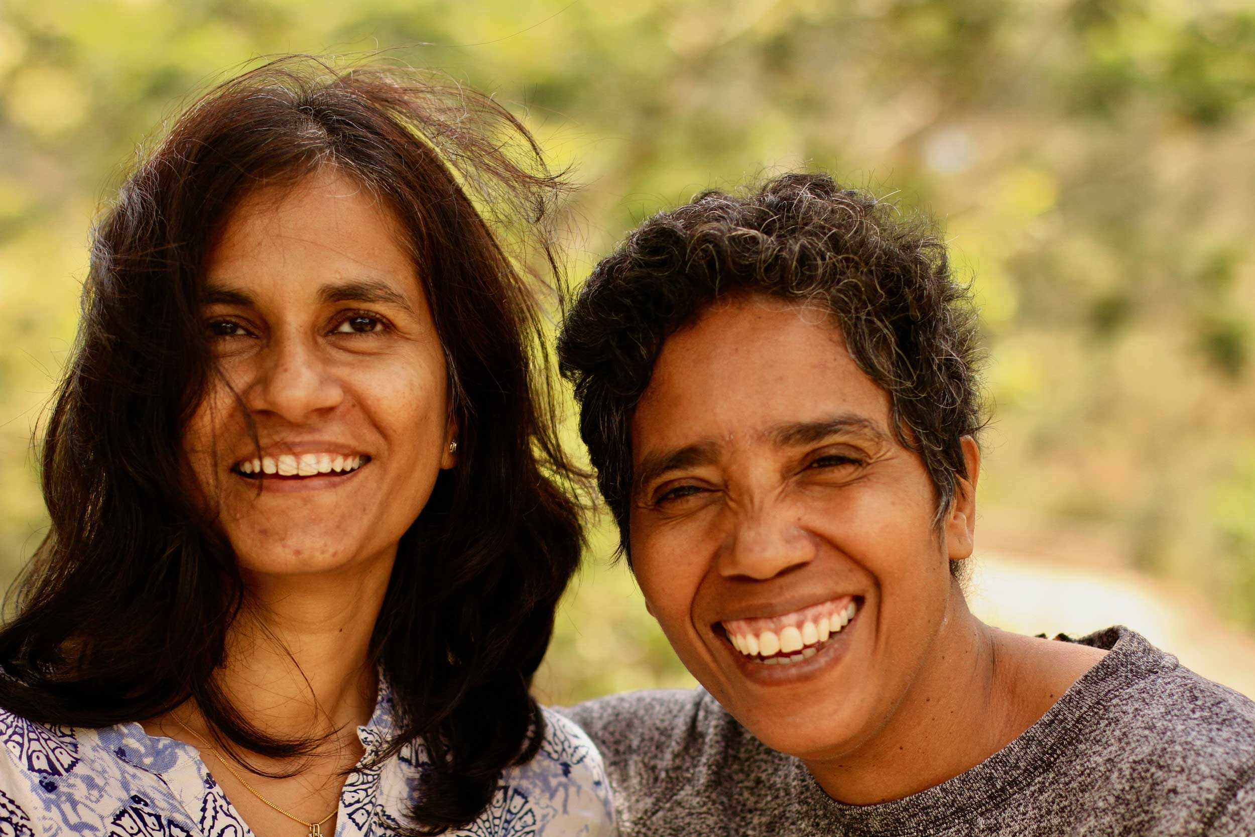 close up of two smilimg women, Timor-Leste