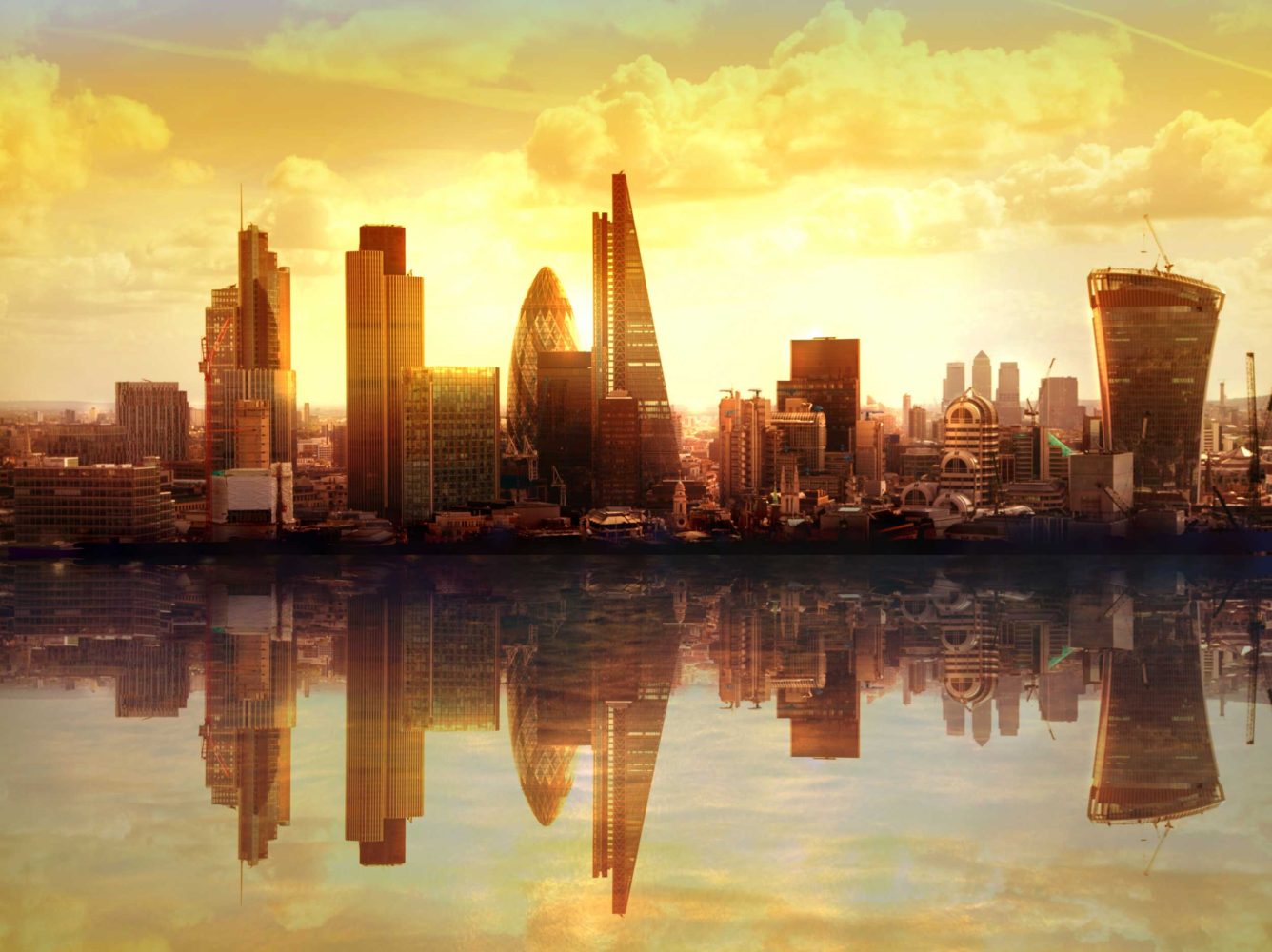 London Business District skyline in a bright yellow sunset