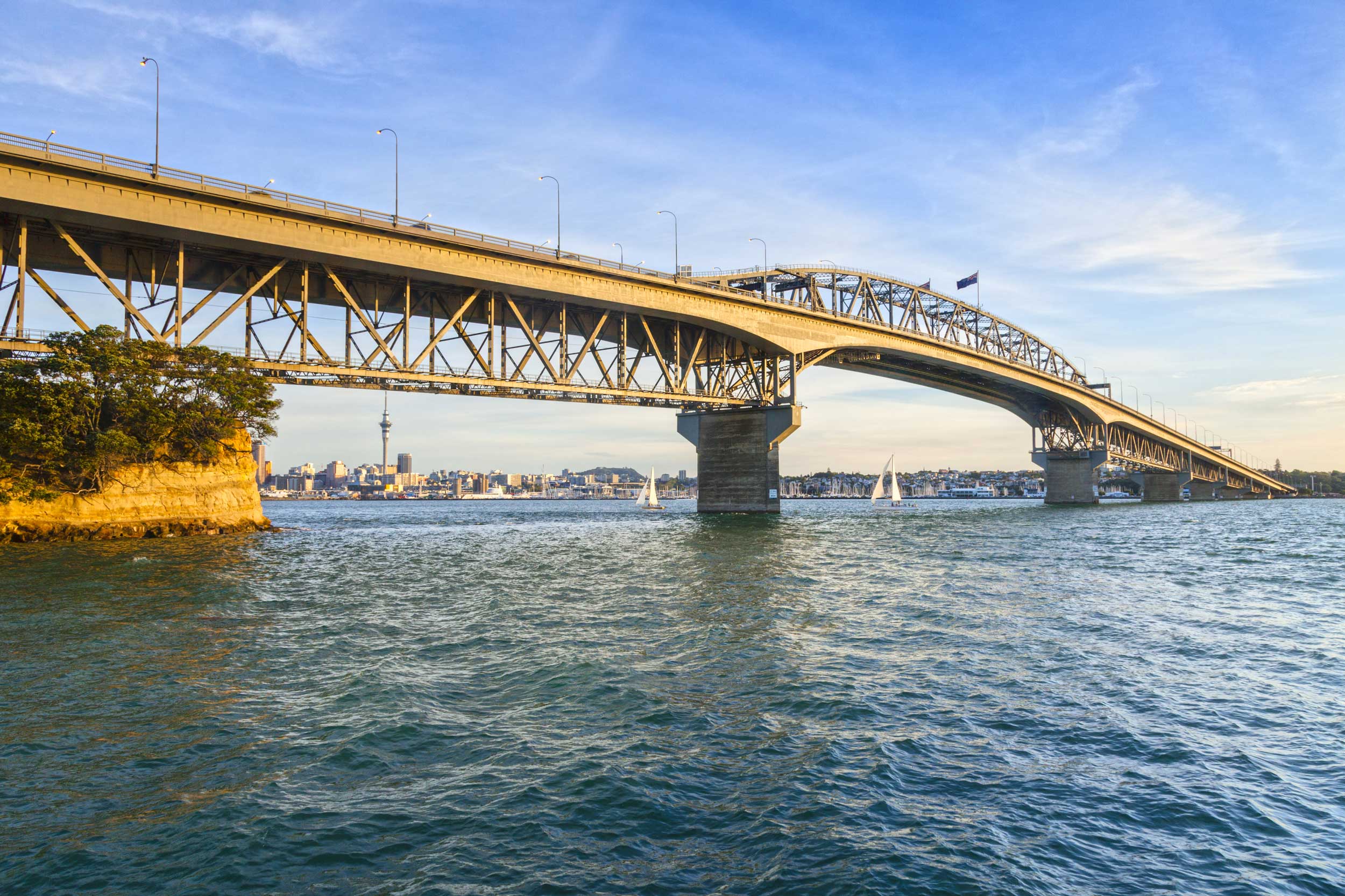 A box-truss bridge spanning the harbour, Auckland.