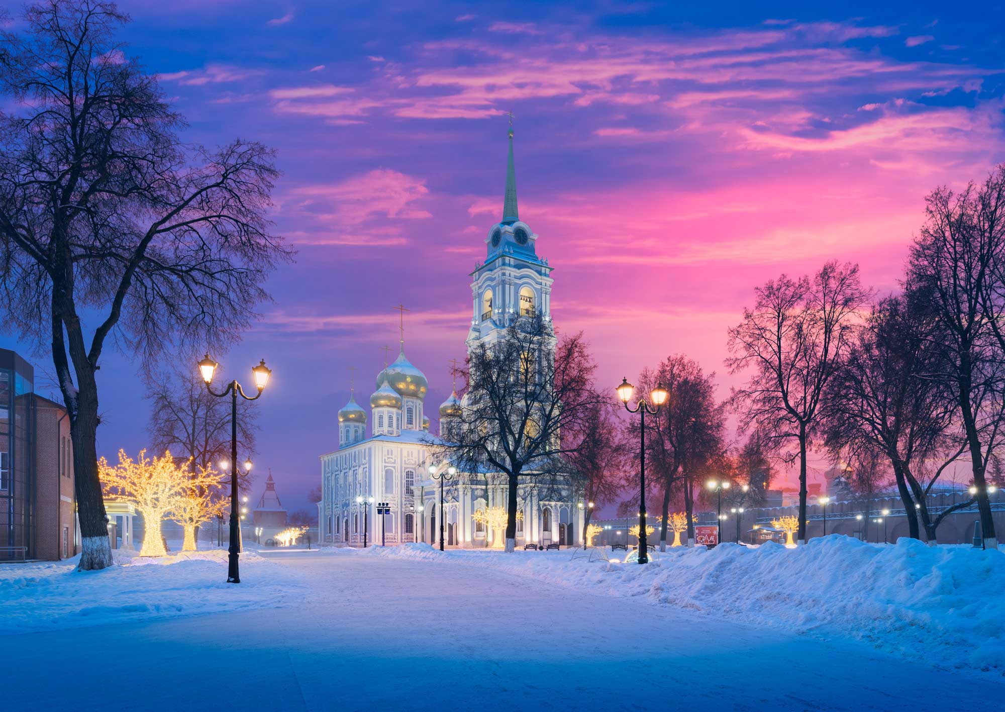A large ancient cathedral lit up in the snow, Tula, Russia